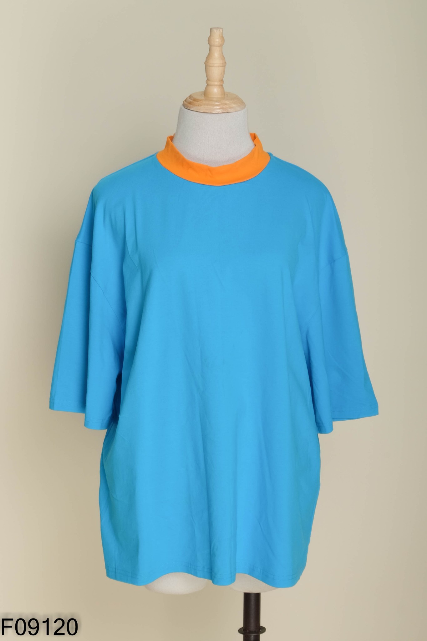 Áo xanh phối cam