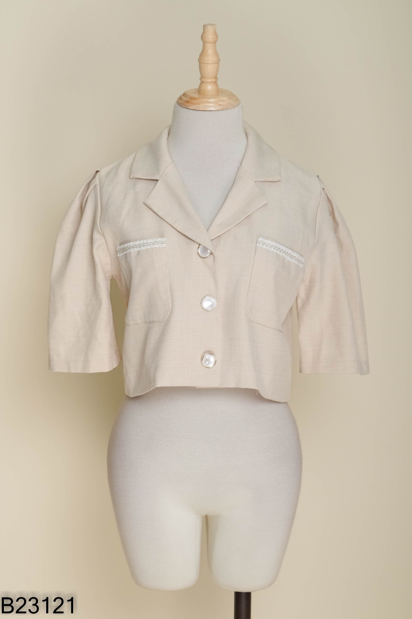 Áo be cổ vest