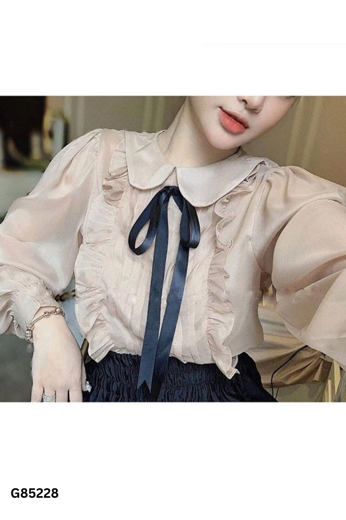 Áo nâu be viền bèo nơ đen