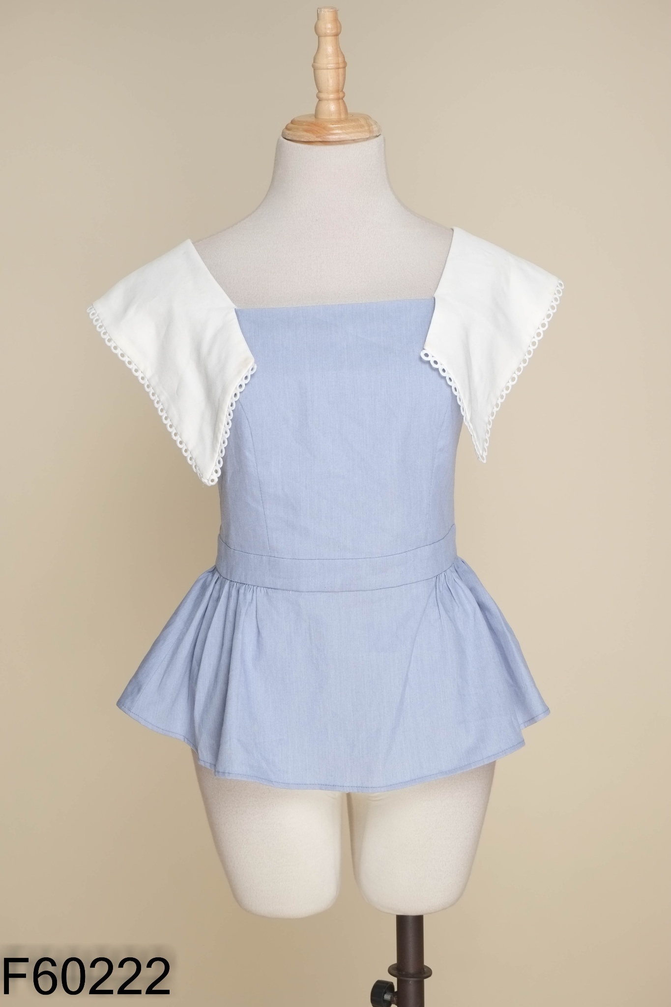 Áo xanh D.CHIC vạt trắng