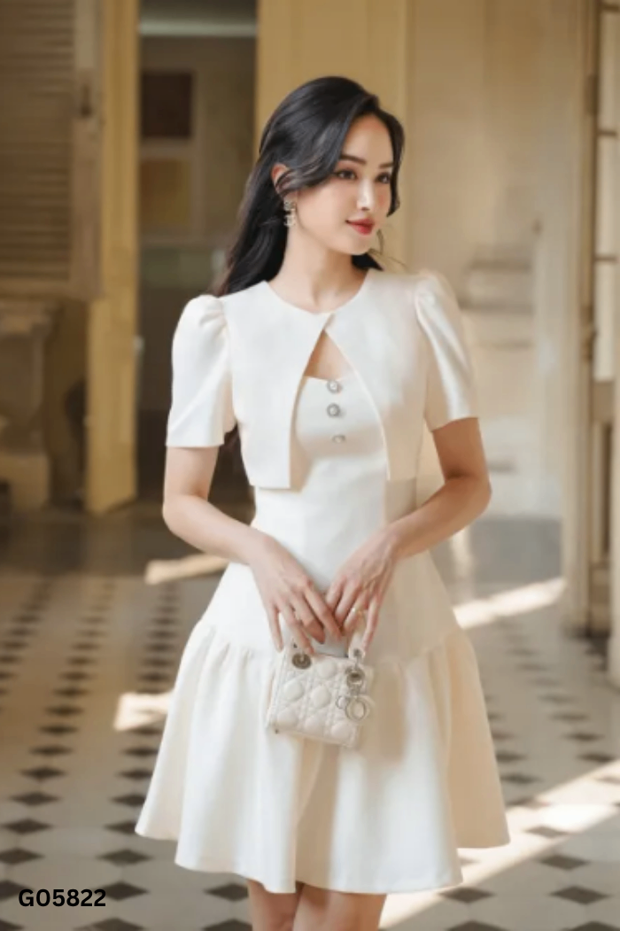 Váy be TIIN cúc ngọc