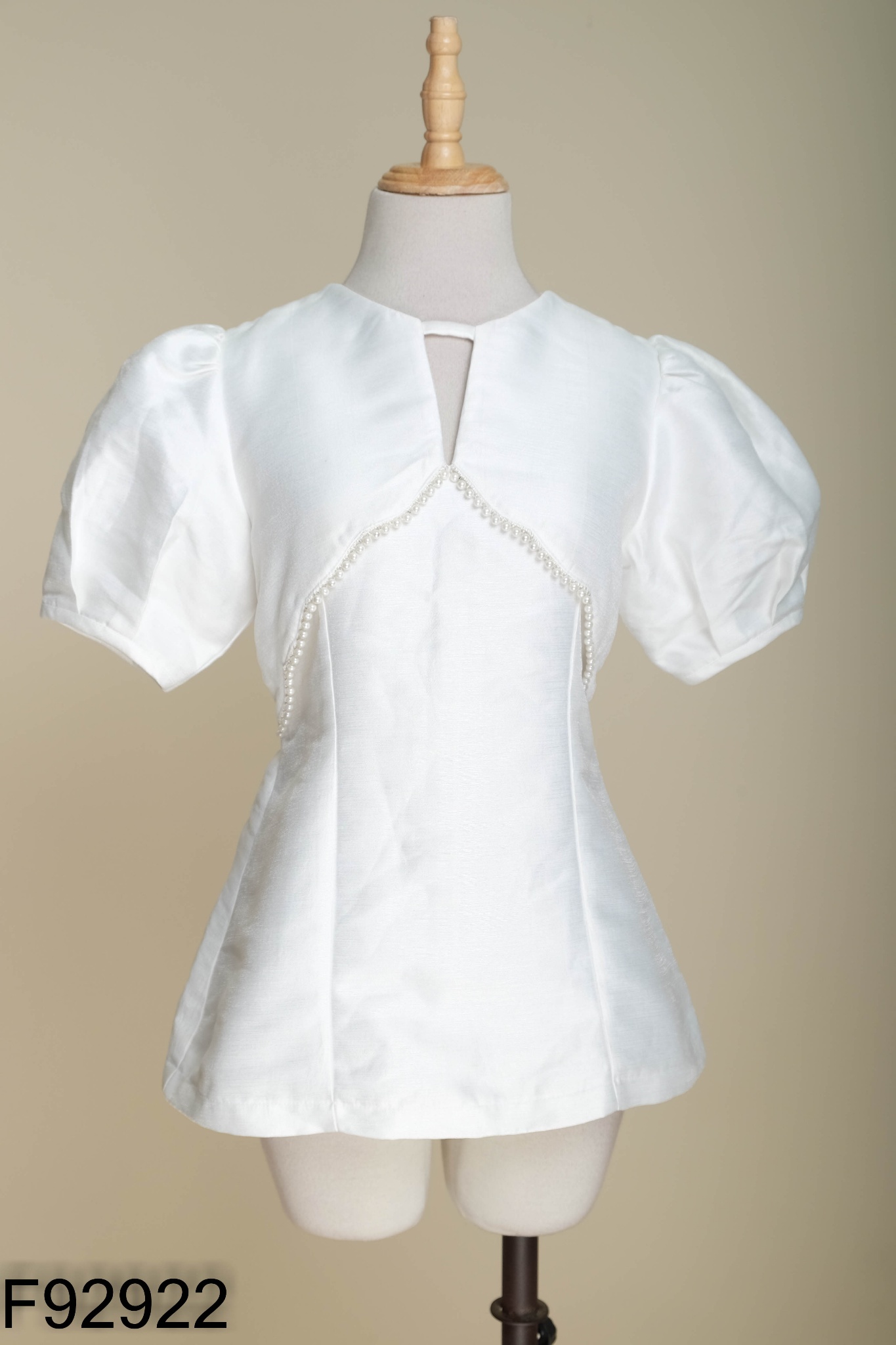 Áo POPO trắng viền ngọc