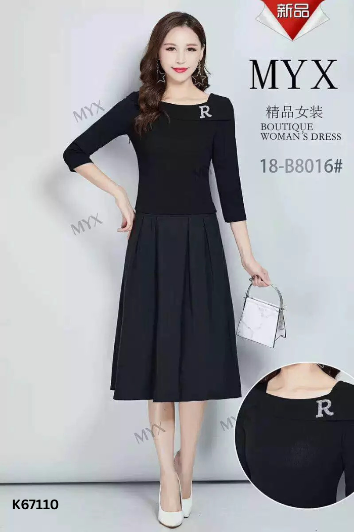 Váy len đen phối thô cài đá