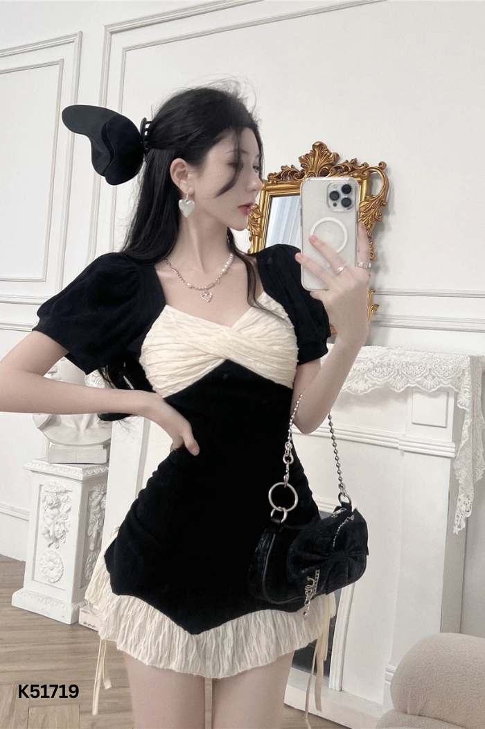 Váy đen bèo trắng