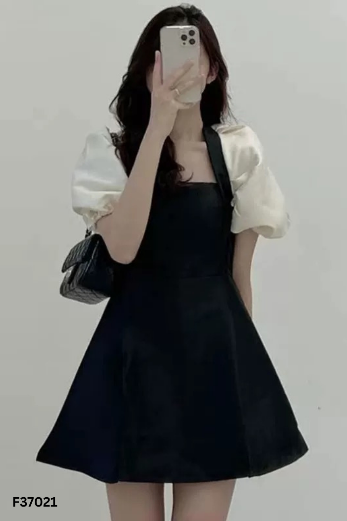 Váy đen phối tay be phồng