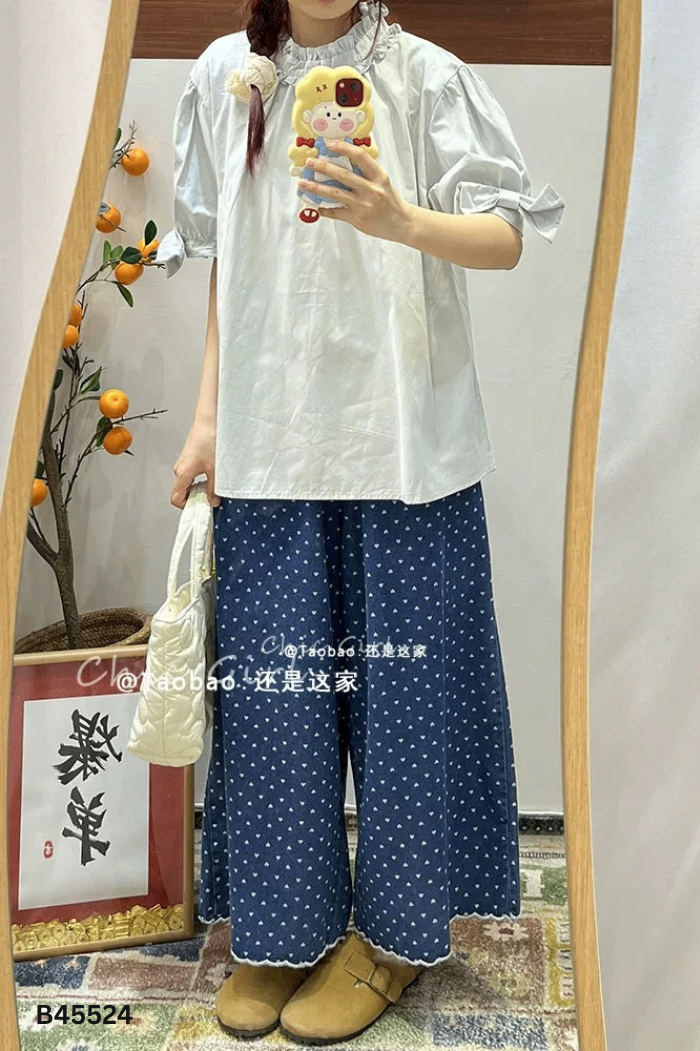 Áo lụa xanh nhạt cổ bèo