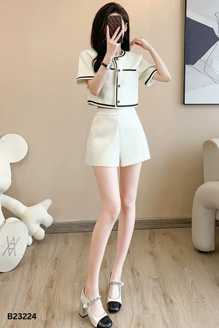 Áo TIIN trắng viền đen