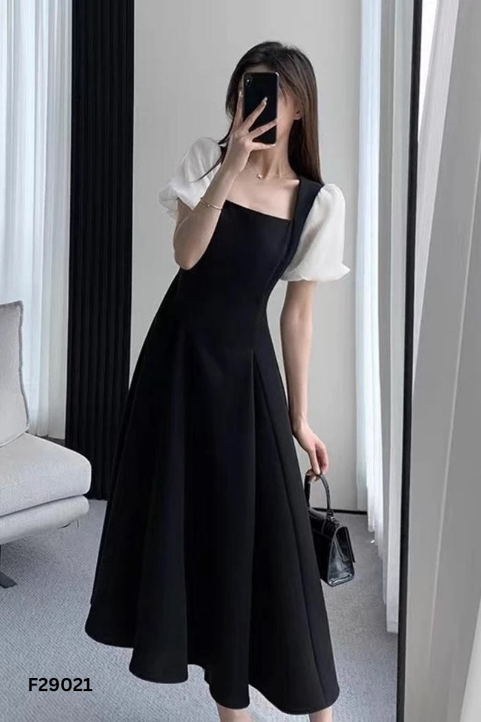 Váy nhỡ đen phối tay be