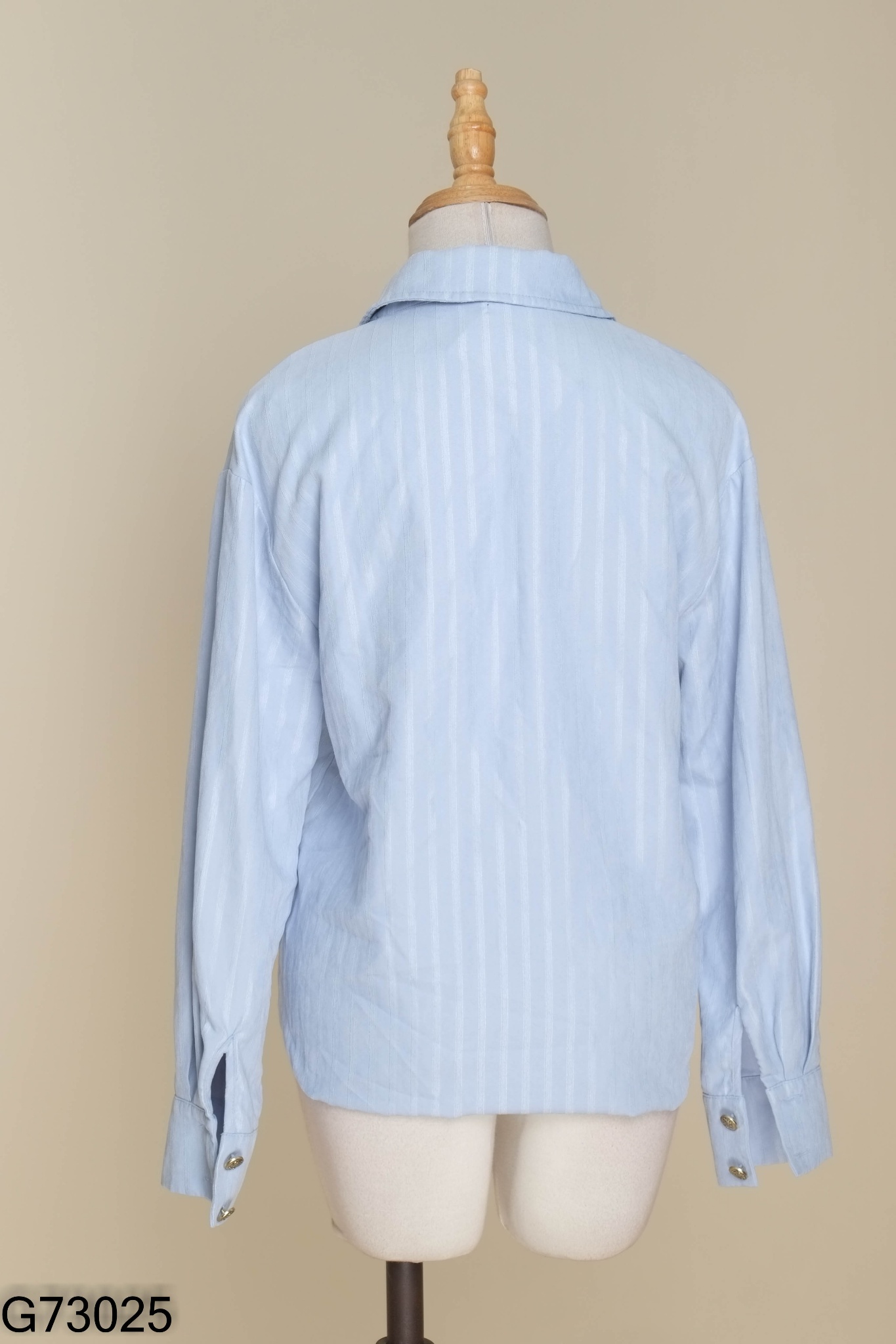 Áo xanh cổ vest