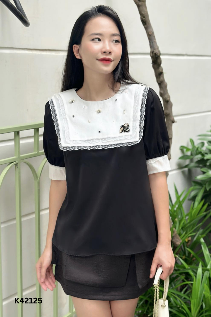 Áo đen cổ trắng