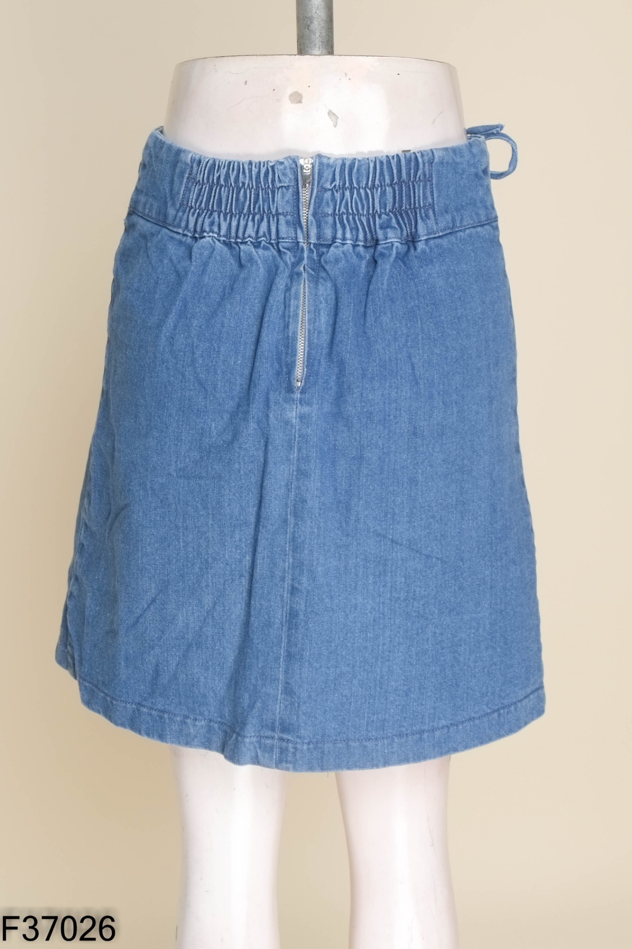 Chân váy jeans xanh đan dây