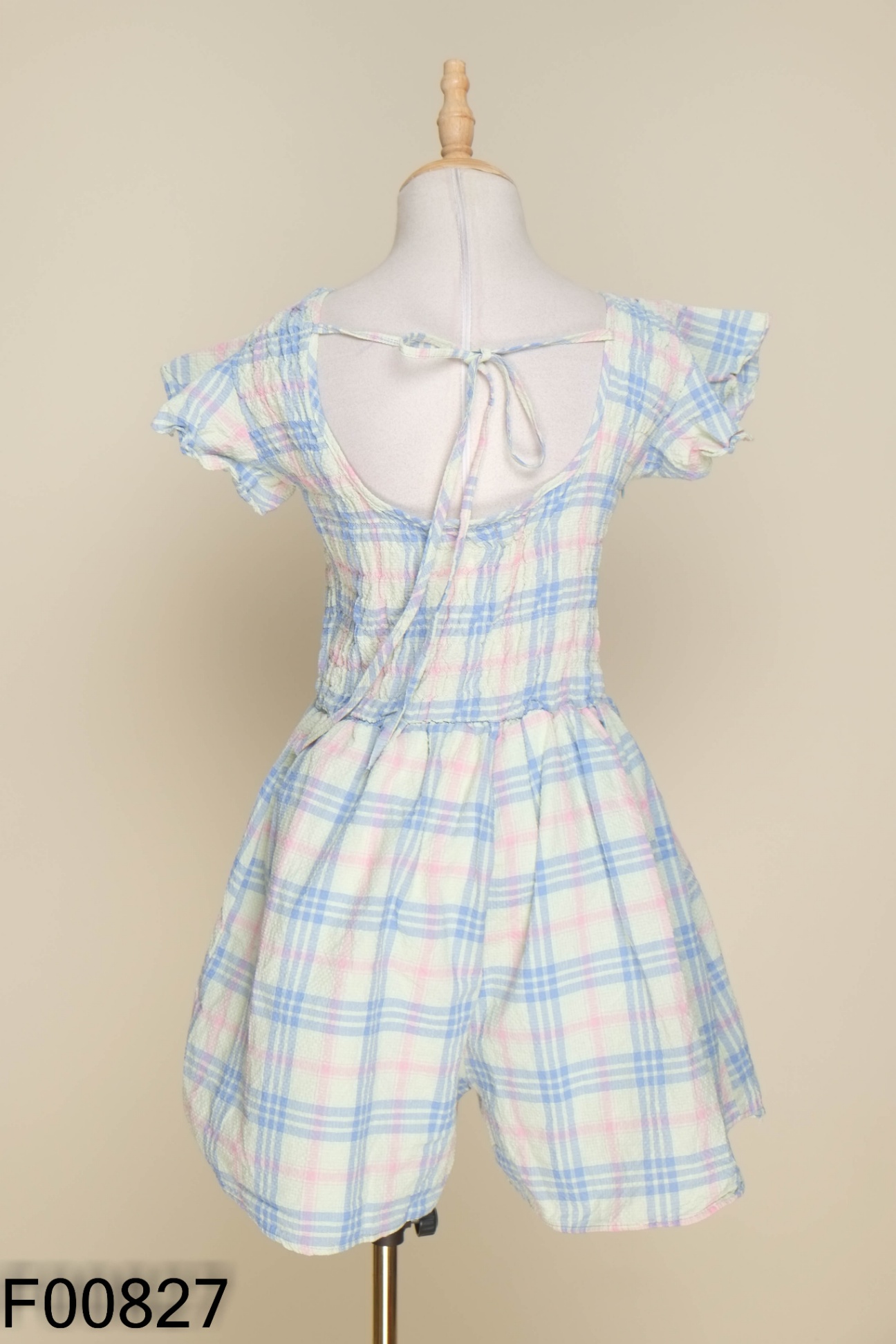 Jumpsuit xanh kẻ