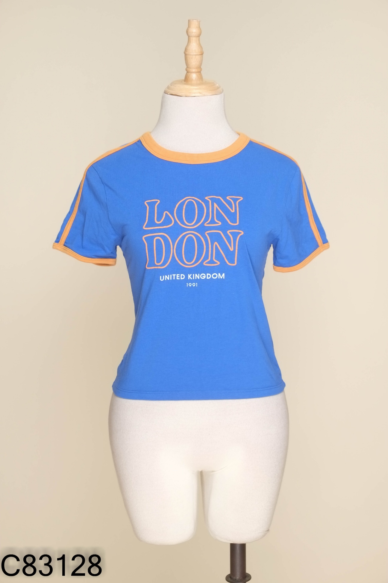 Áo xanh coban COTTON ON viền nâu