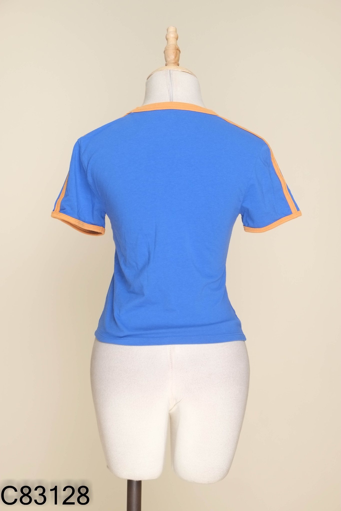 Áo xanh coban COTTON ON viền nâu