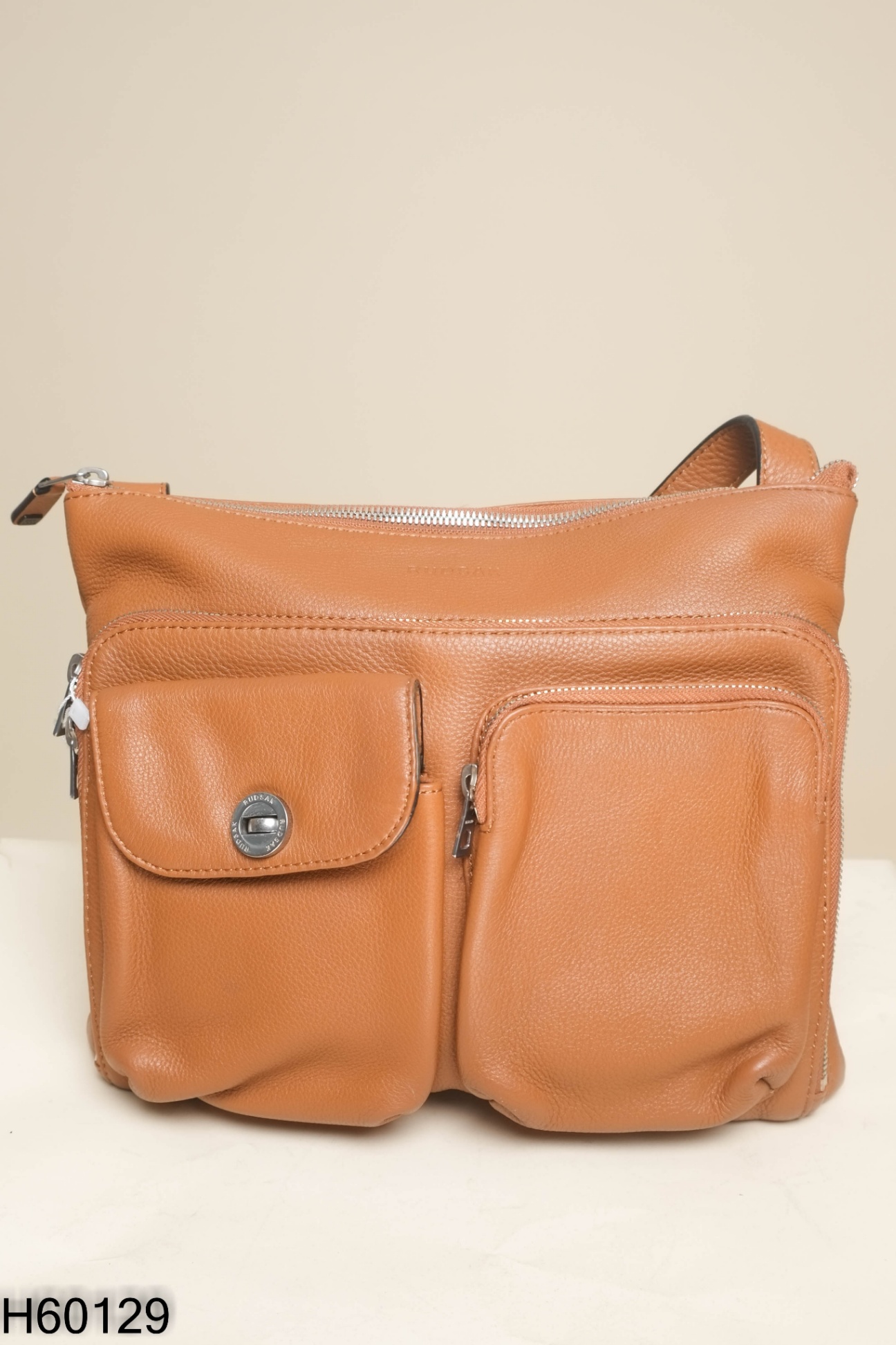 Túi da nâu khóa bạc (da thật)