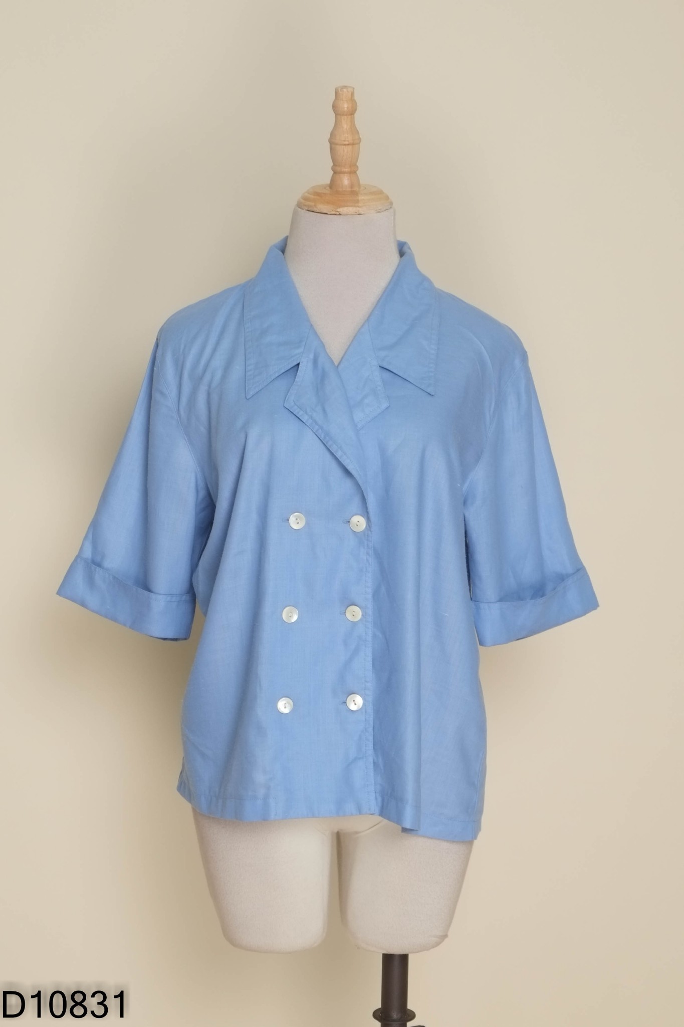 Áo cổ vest xanh
