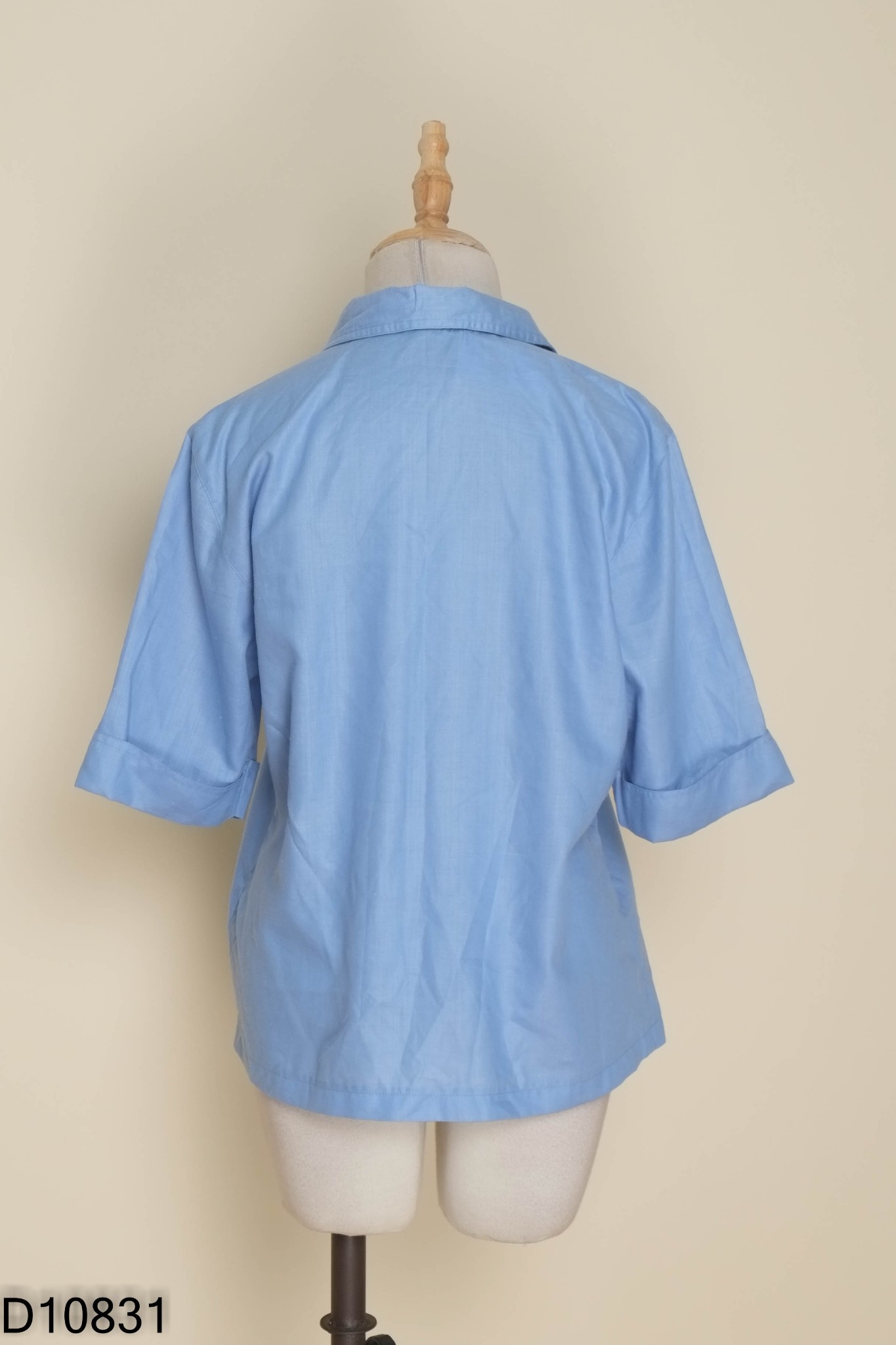 Áo cổ vest xanh