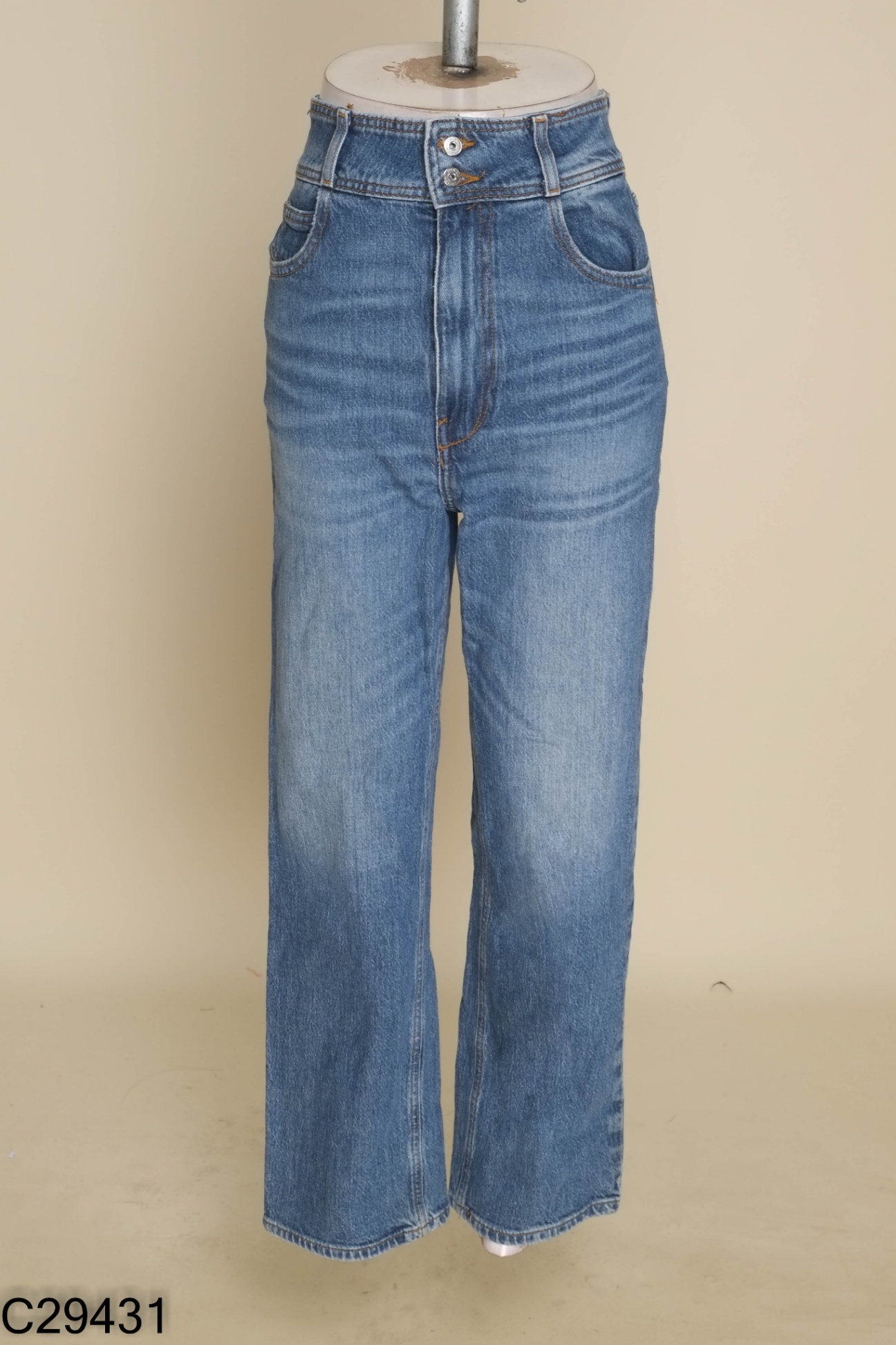 Quần jeans xanh cúc đôi