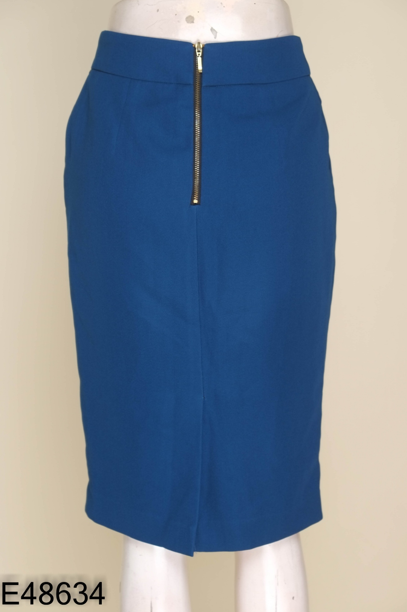 Chân váy NEM xanh đính nơ