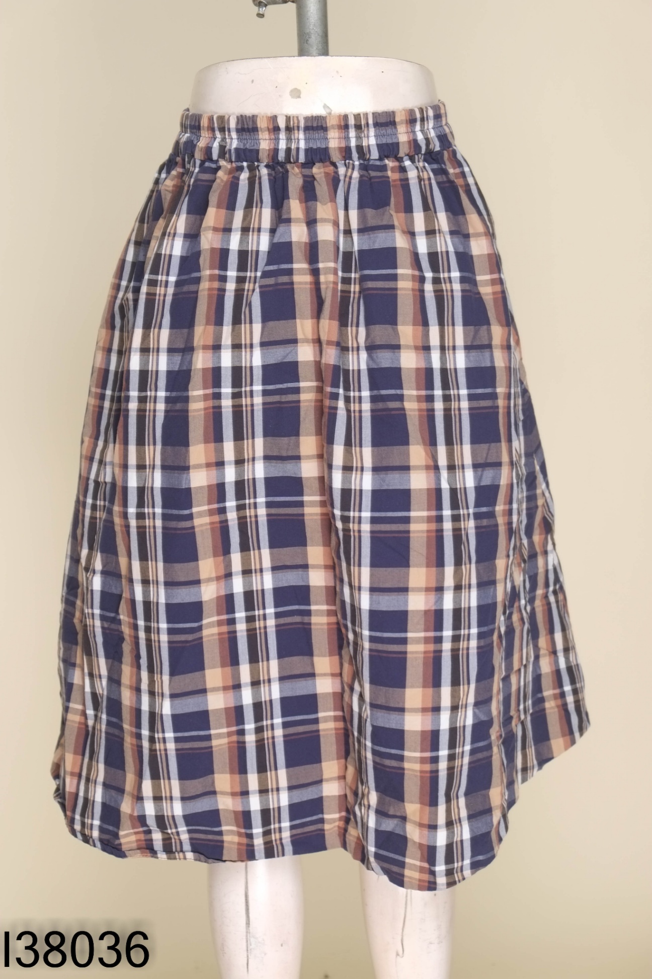 Chân váy GU xanh than kẻ caro