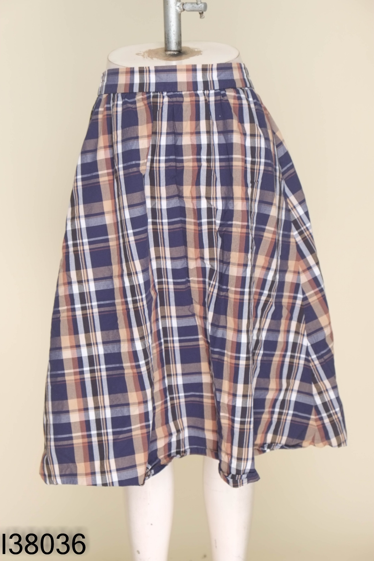 Chân váy GU xanh than kẻ caro