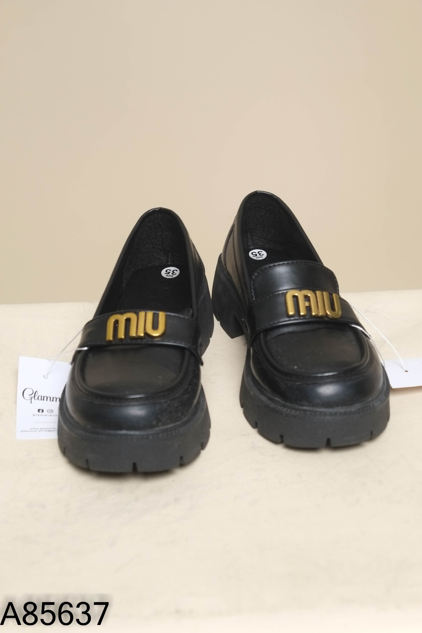 Giày loafer đen phối kim loại