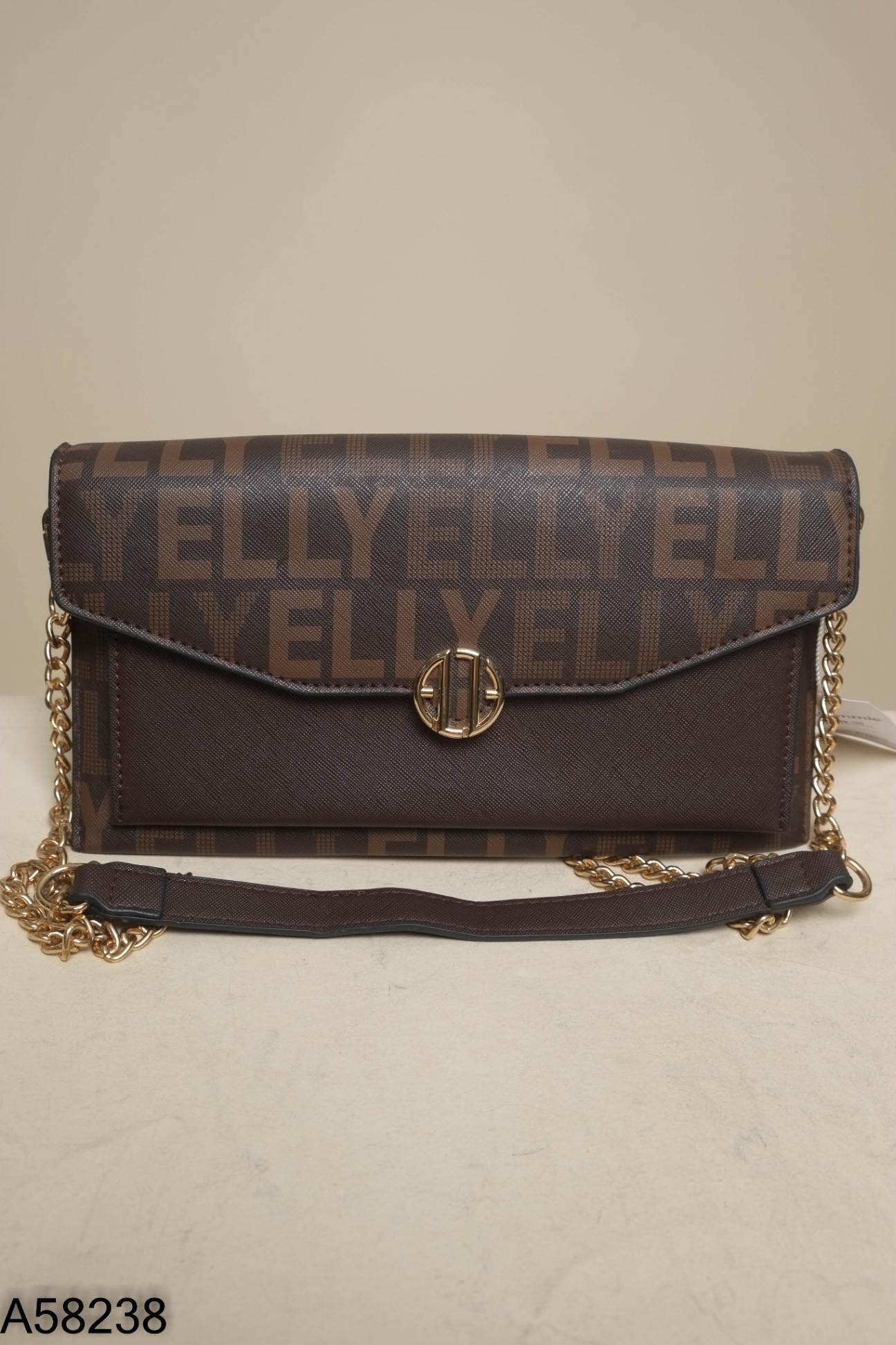 Túi xách ELLY nâu chữ cầm tay