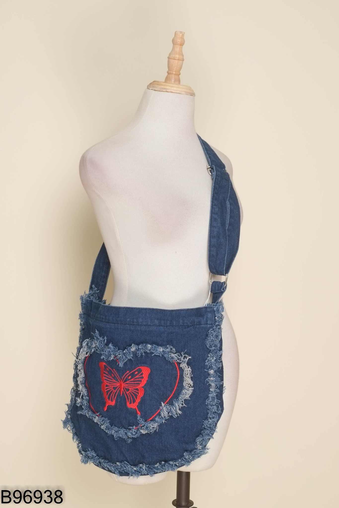 Túi jeans xanh viền tua rua