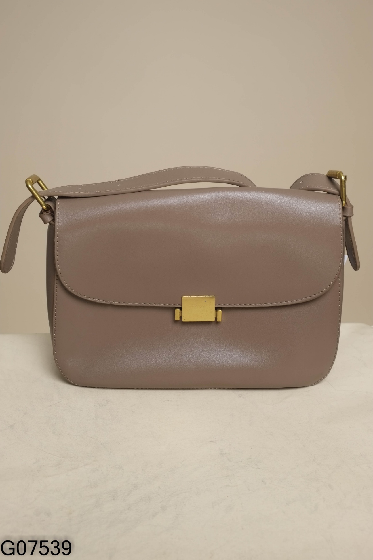 Túi da nâu ghi khóa vàng