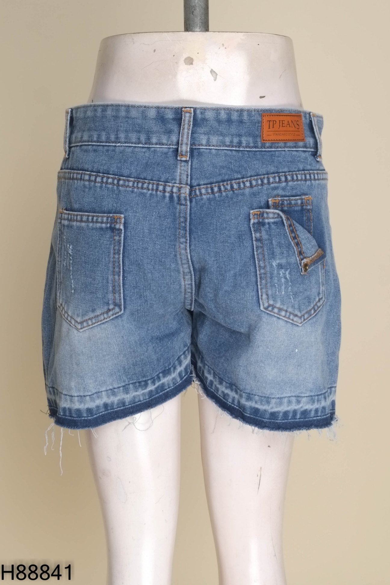 Quần jeans xanh rách giả váy