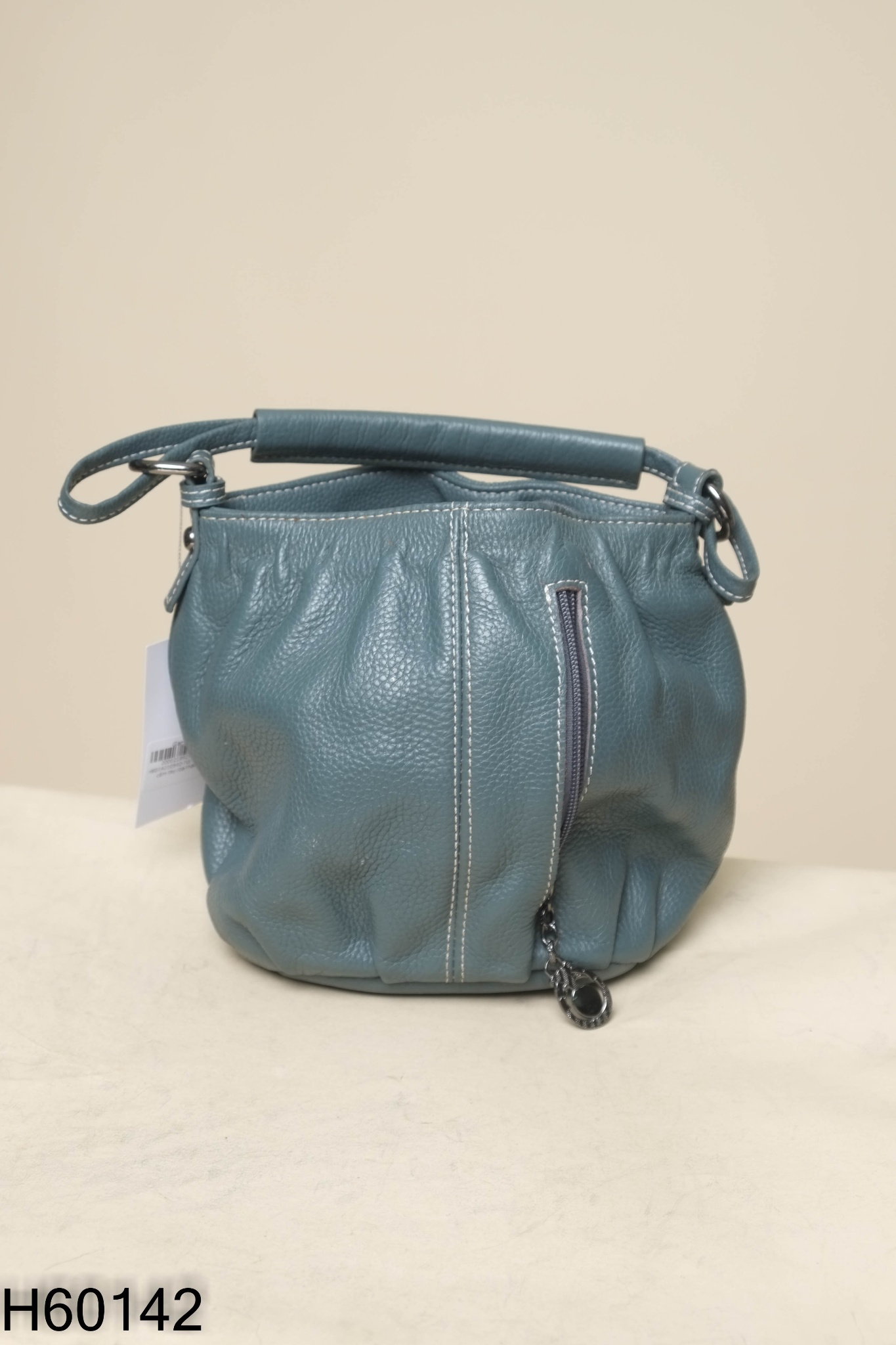 Túi da xanh cầm tay (da thật)