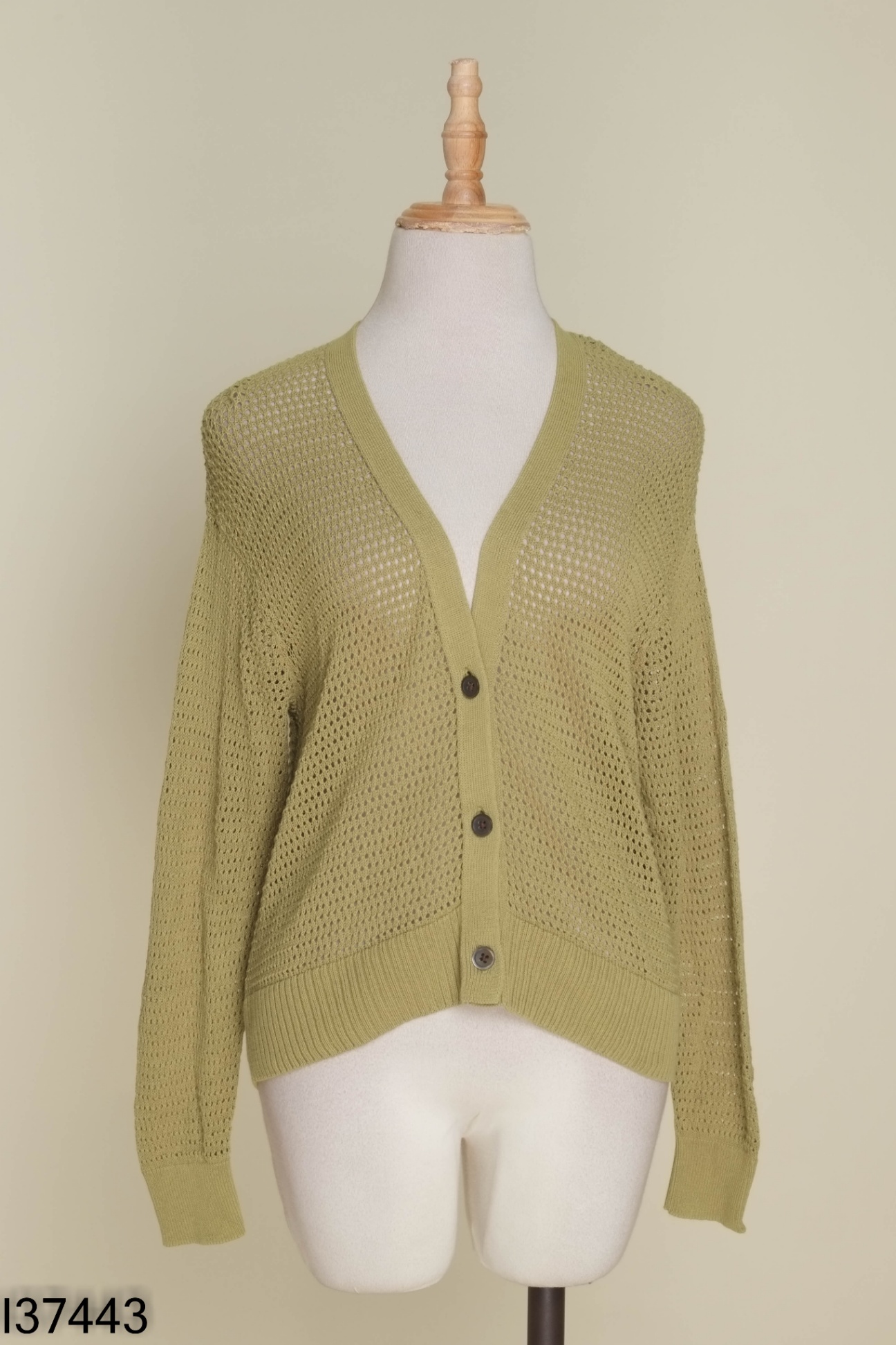 Áo len UNIQLO xanh lỗ