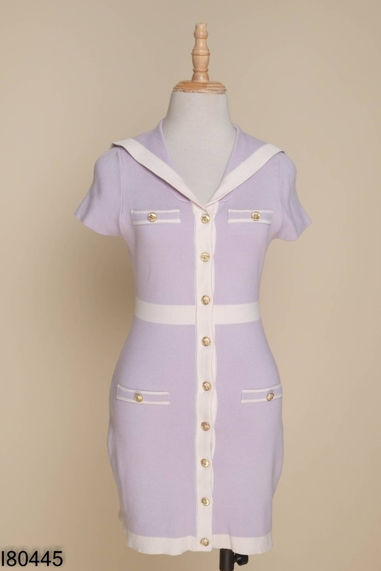 Váy len tím phối viền trắng cúc vàng