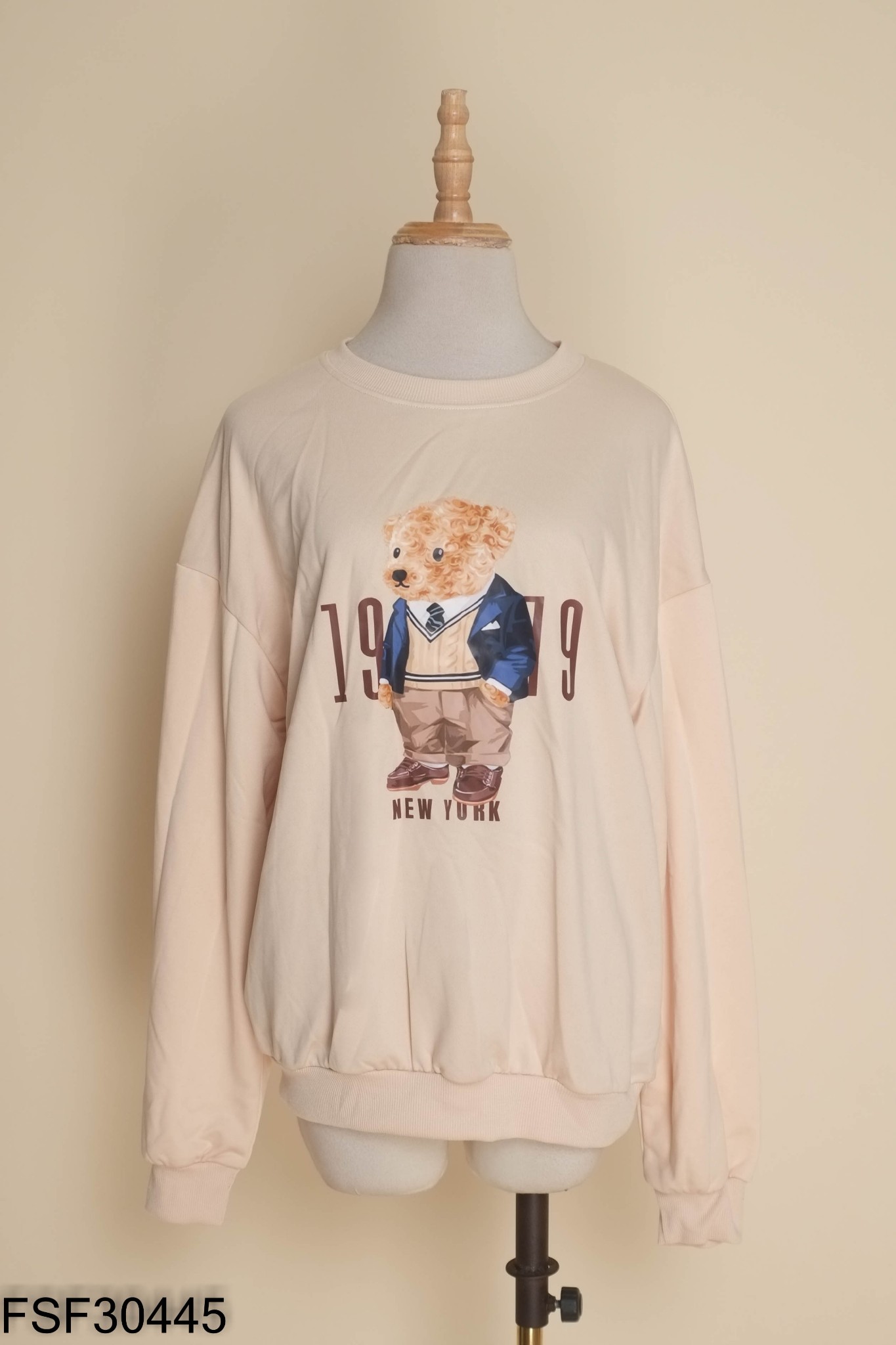 Áo nỉ be in hình gáu