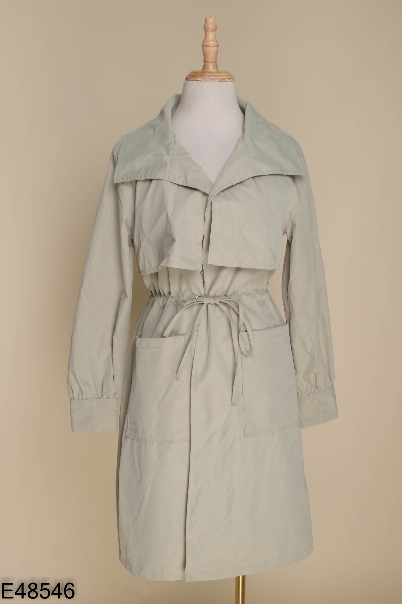 Áo mangto xanh lá nhạt