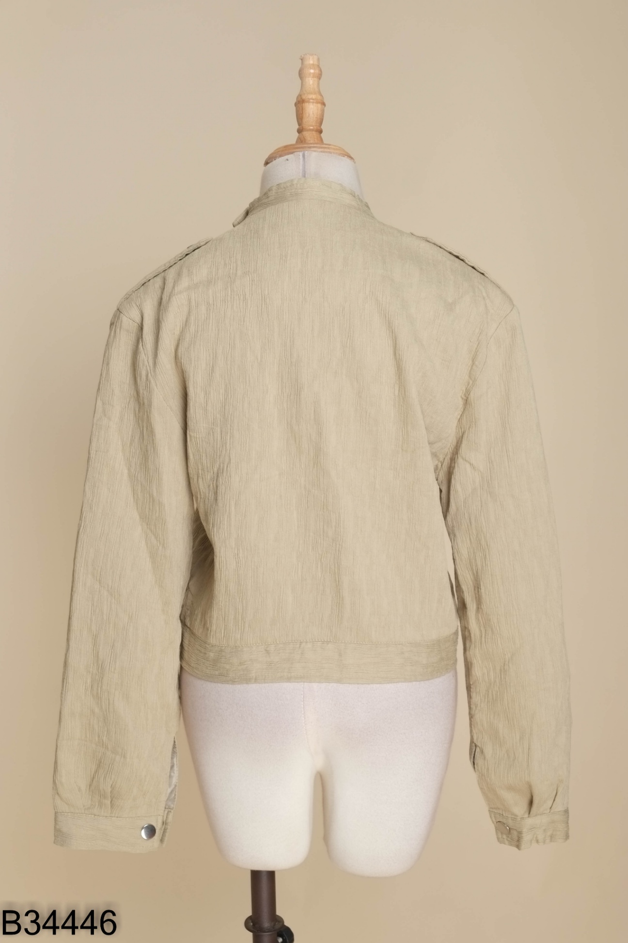 Áo khoác cổ vest xanh cúc bọc