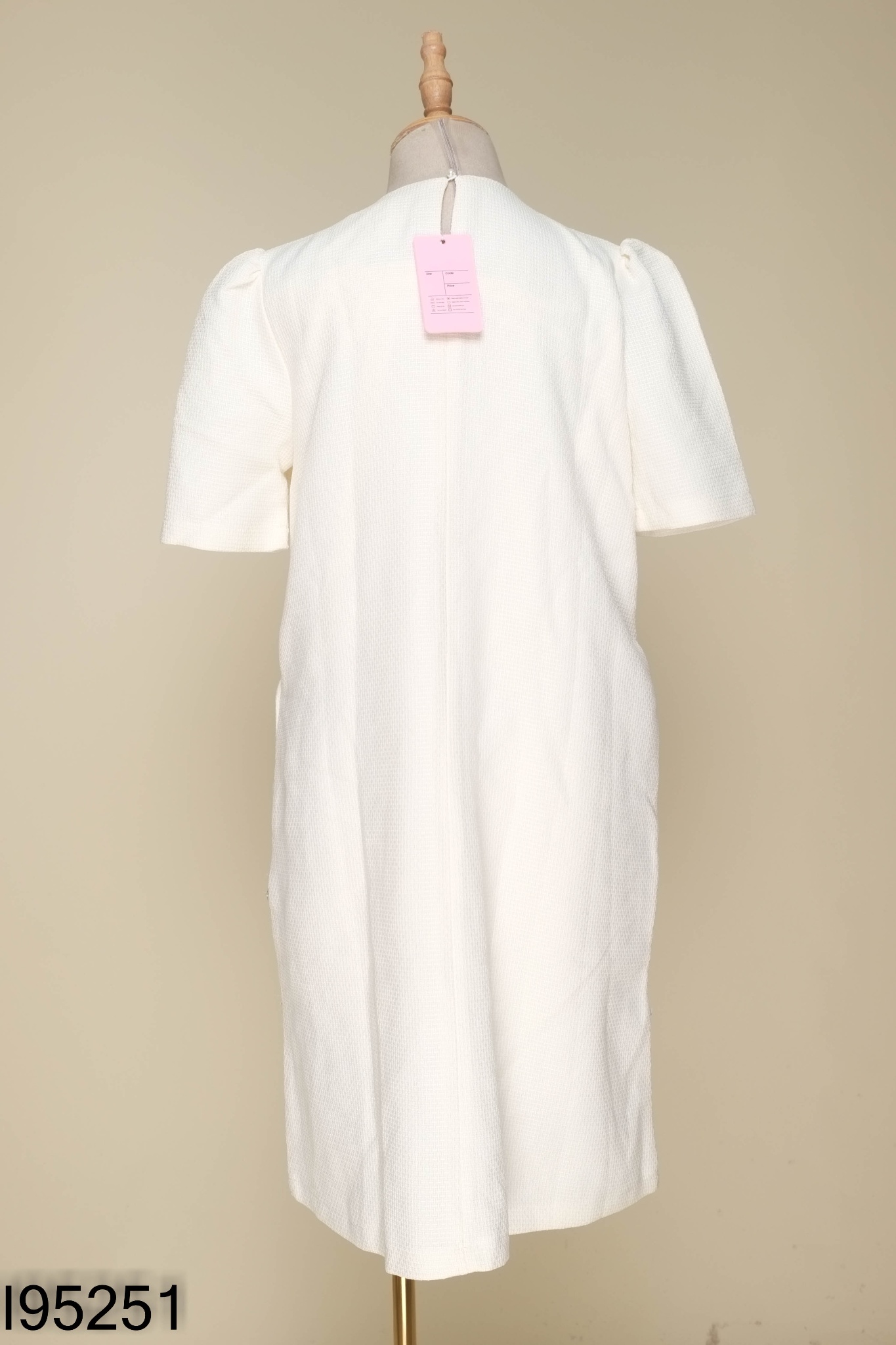 Váy NH CLOTHING dạ kem đính nơ