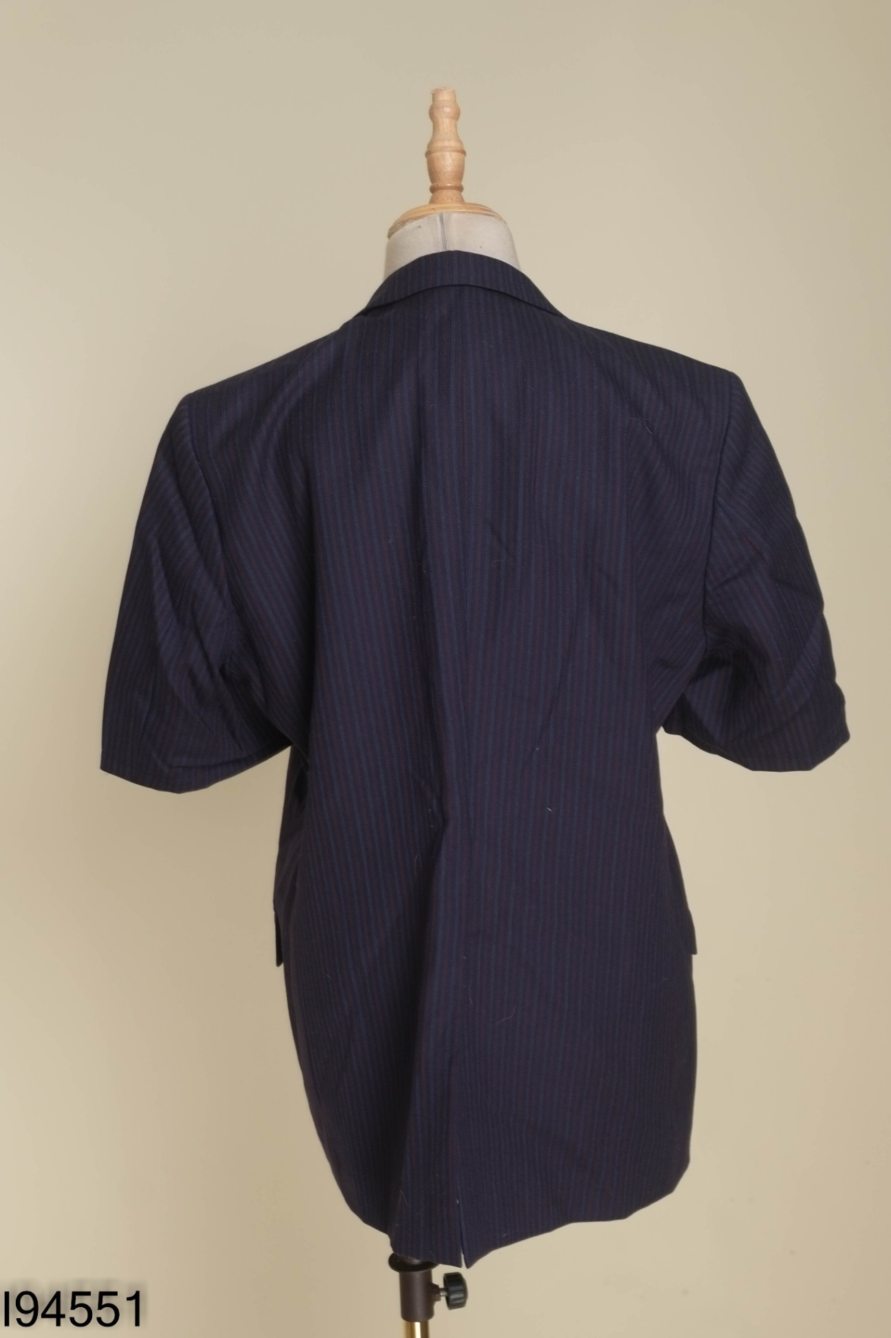 Áo vest xanh phối kẻ sọc