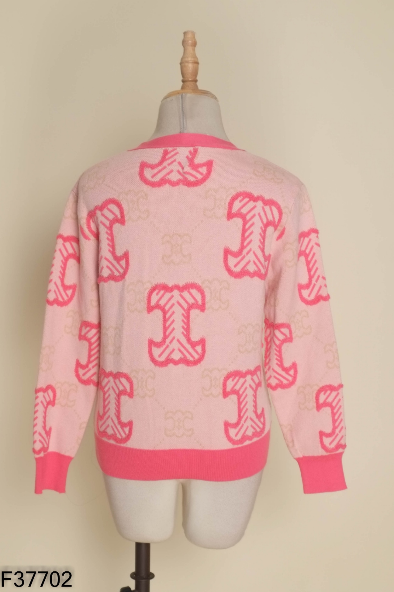 Áo len cardigan hồng phối họa tiết