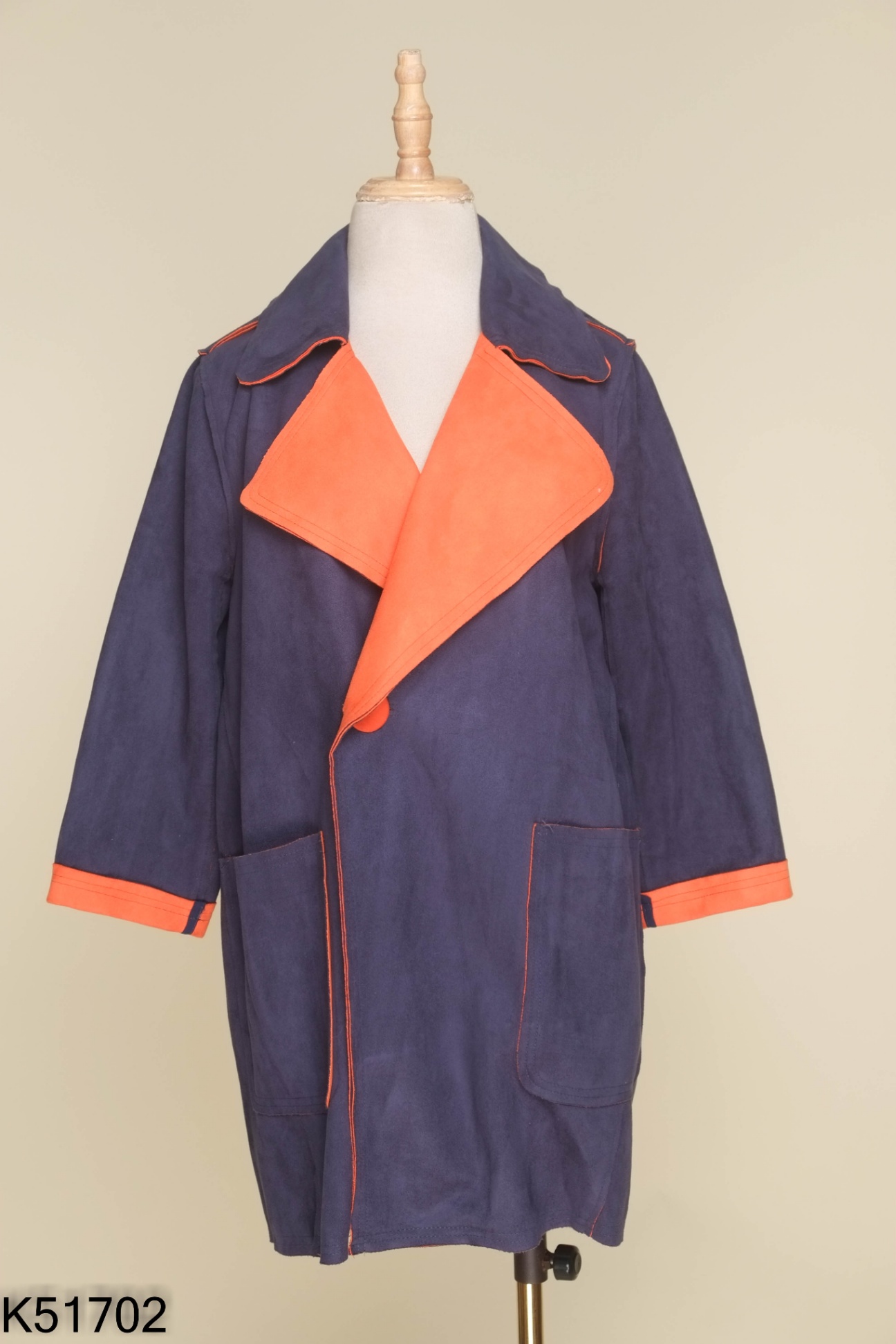 Áo da lộn xanh cổ vest