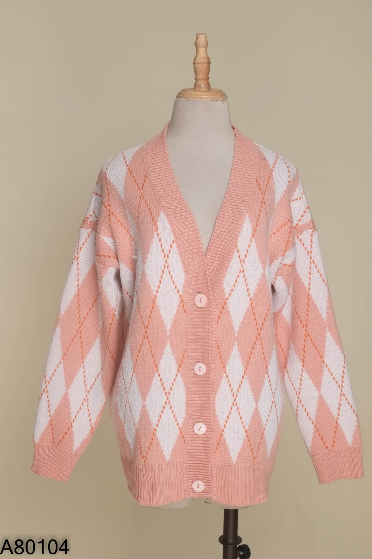 Áo len cardigan hồng phấn họa tiết