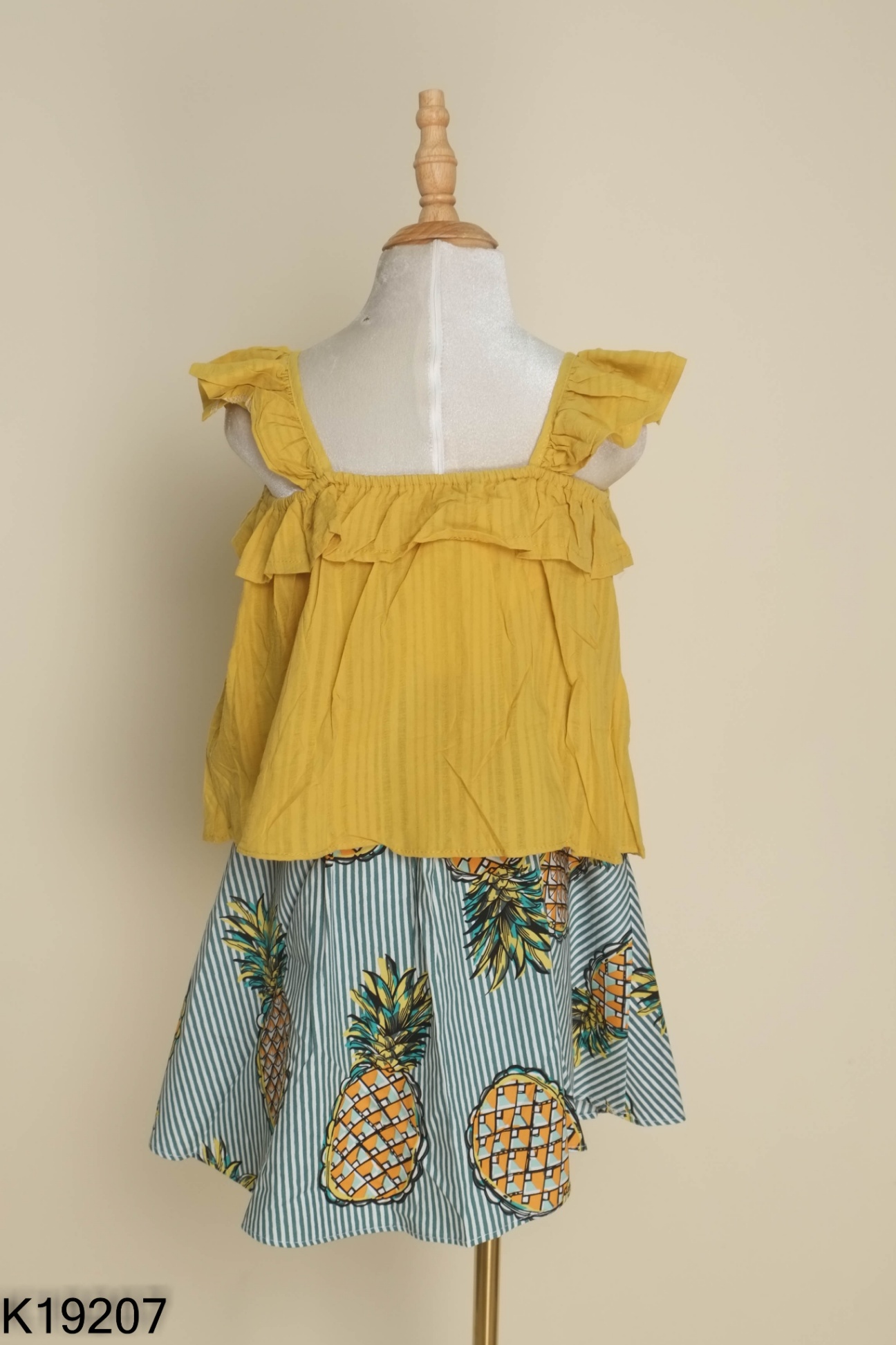 NEWTAG Set Áo hai dây vàng + chân váy sọc KIDS