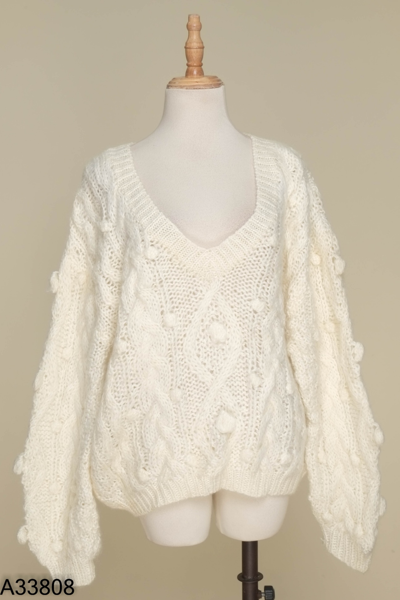 Áo len be vặn thừng cổ V
