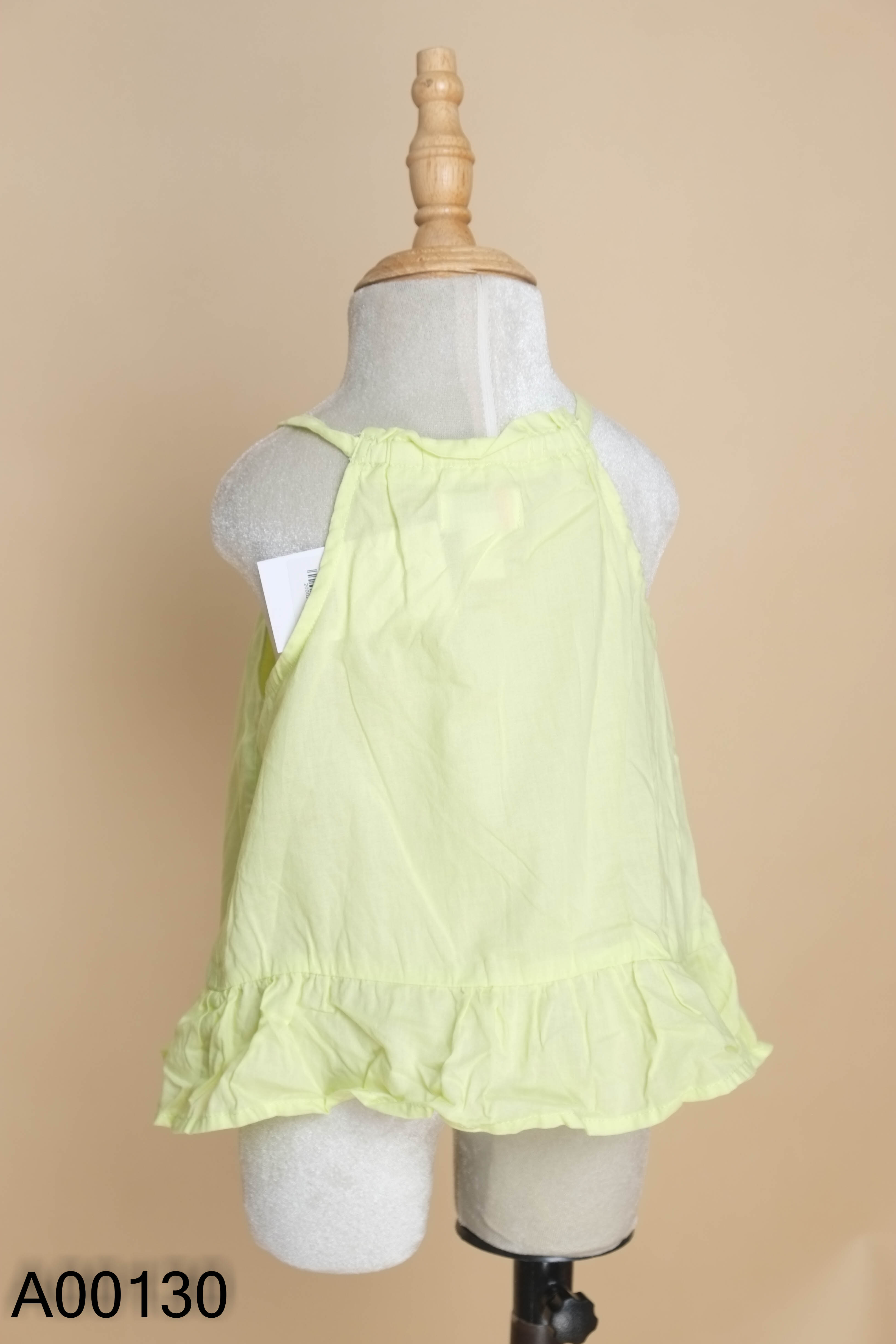 Áo yếm xanh họa tiết KIDS