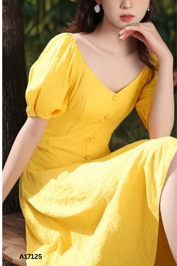 Váy linen vàng phối cúc bọc