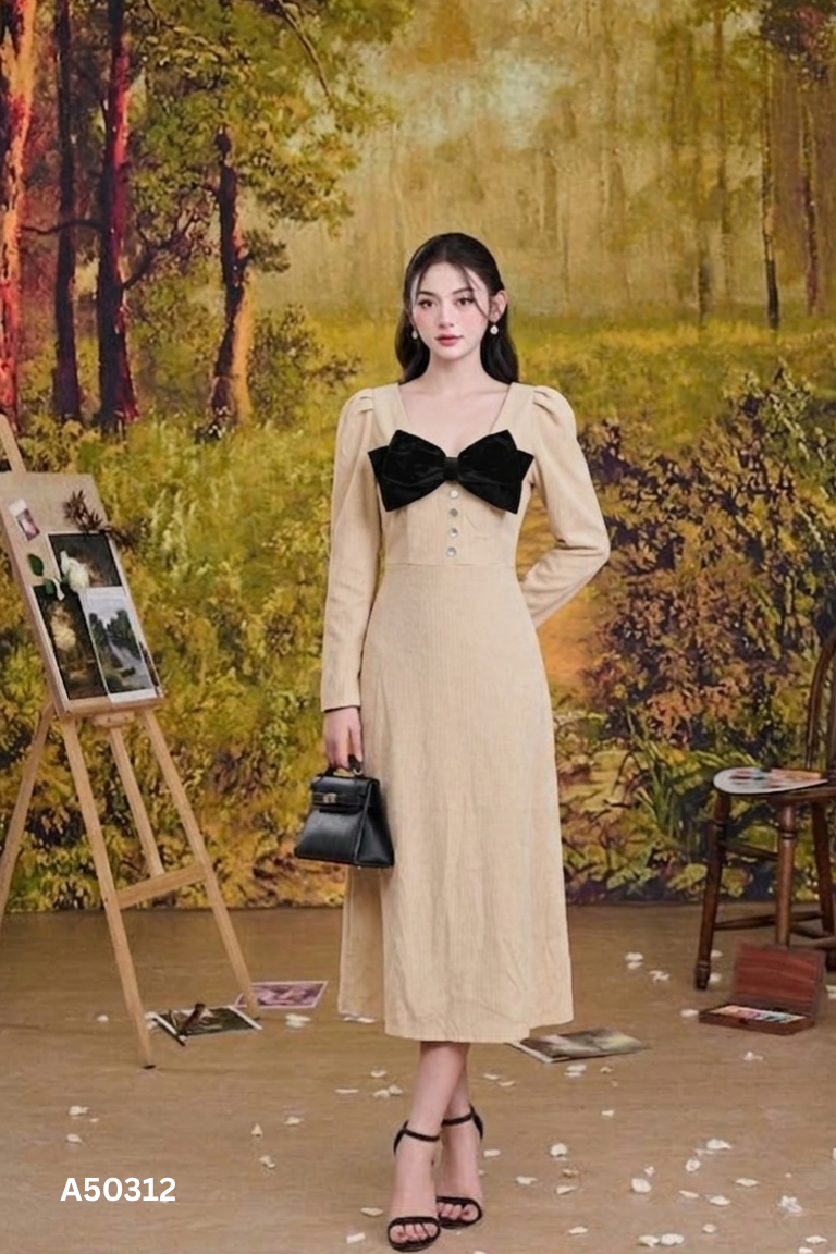 Váy be gân sọc phối nơ đen