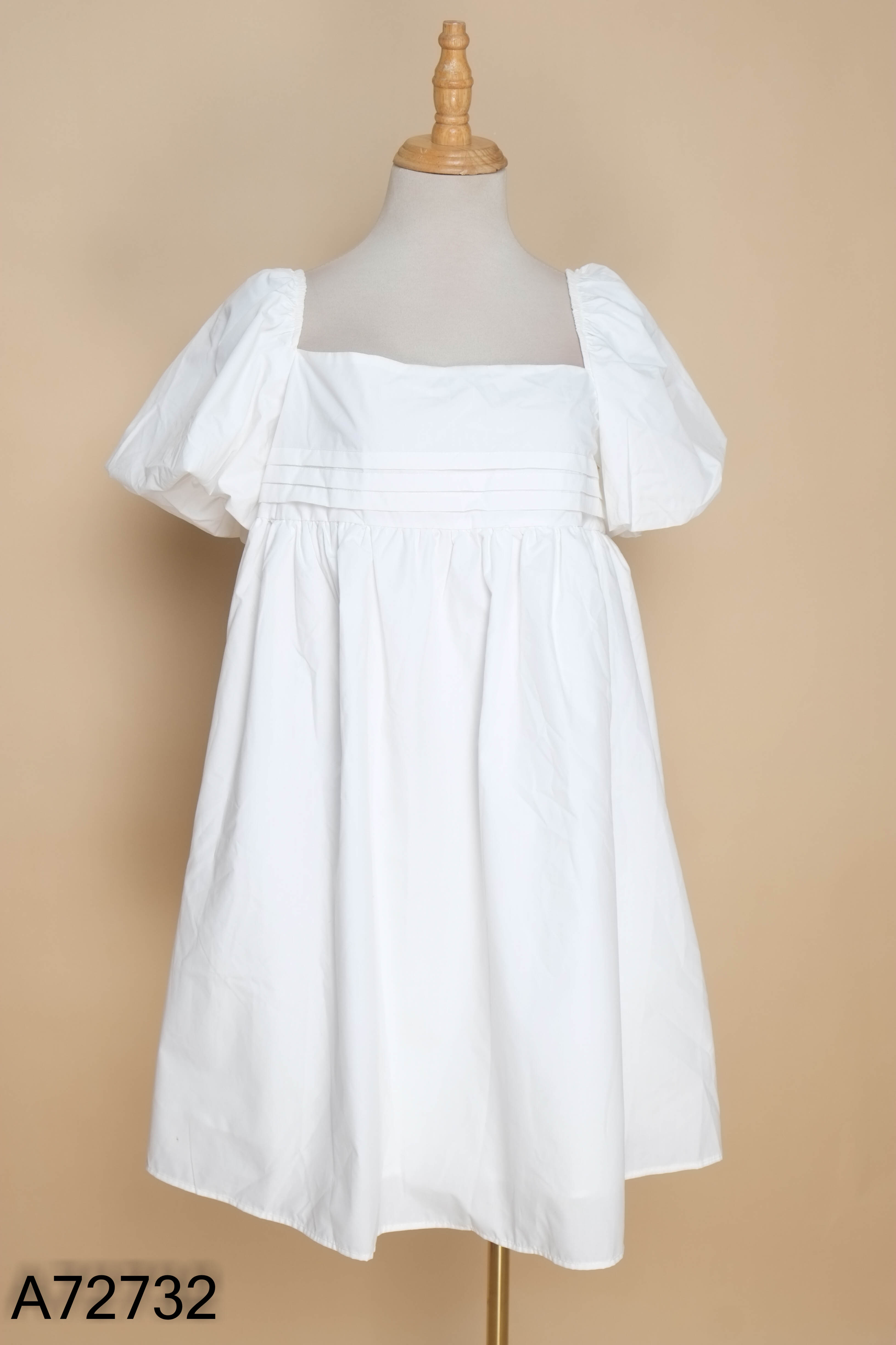 Váy baby doll trắng nơ sau
