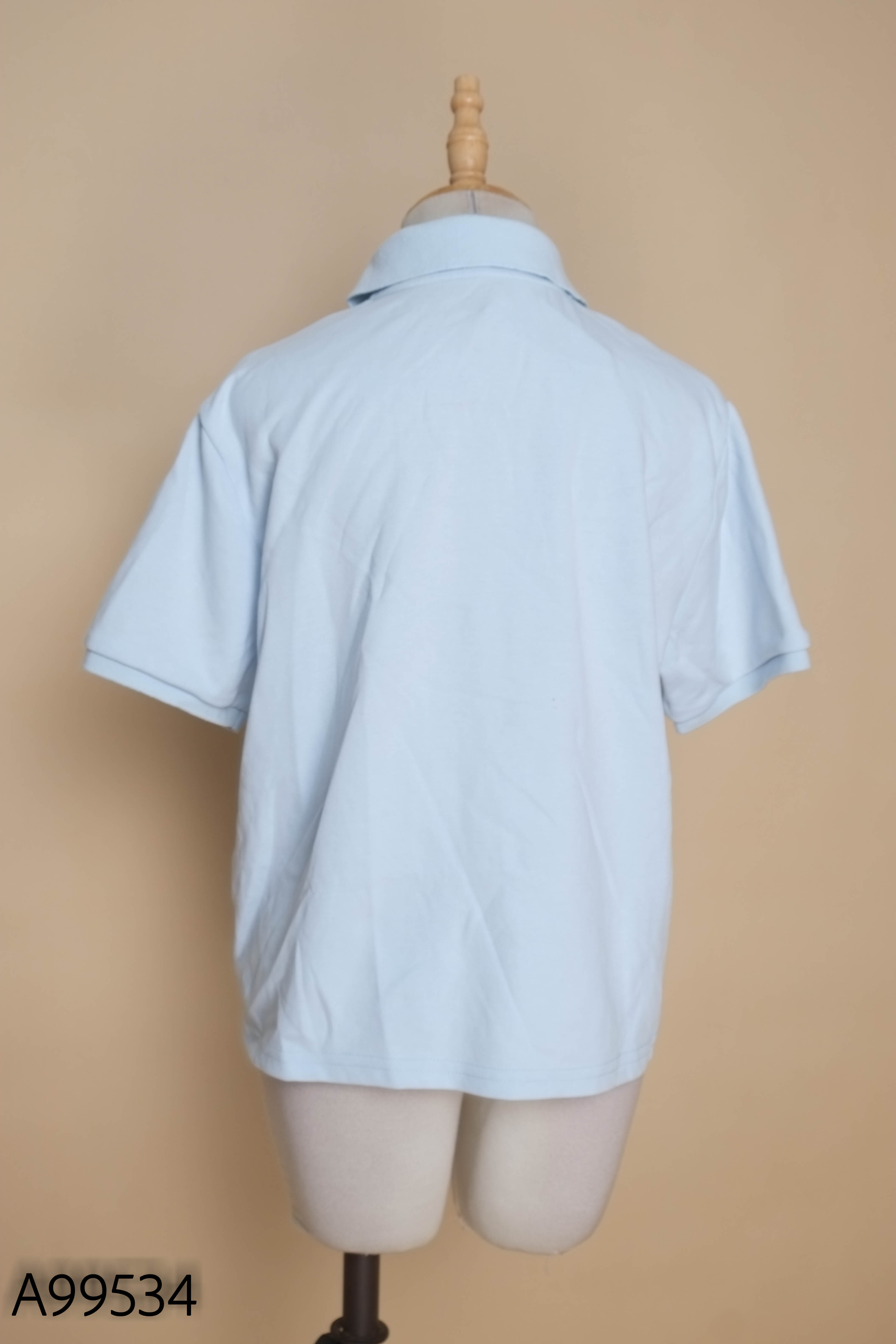 Áo polo xanh pastel