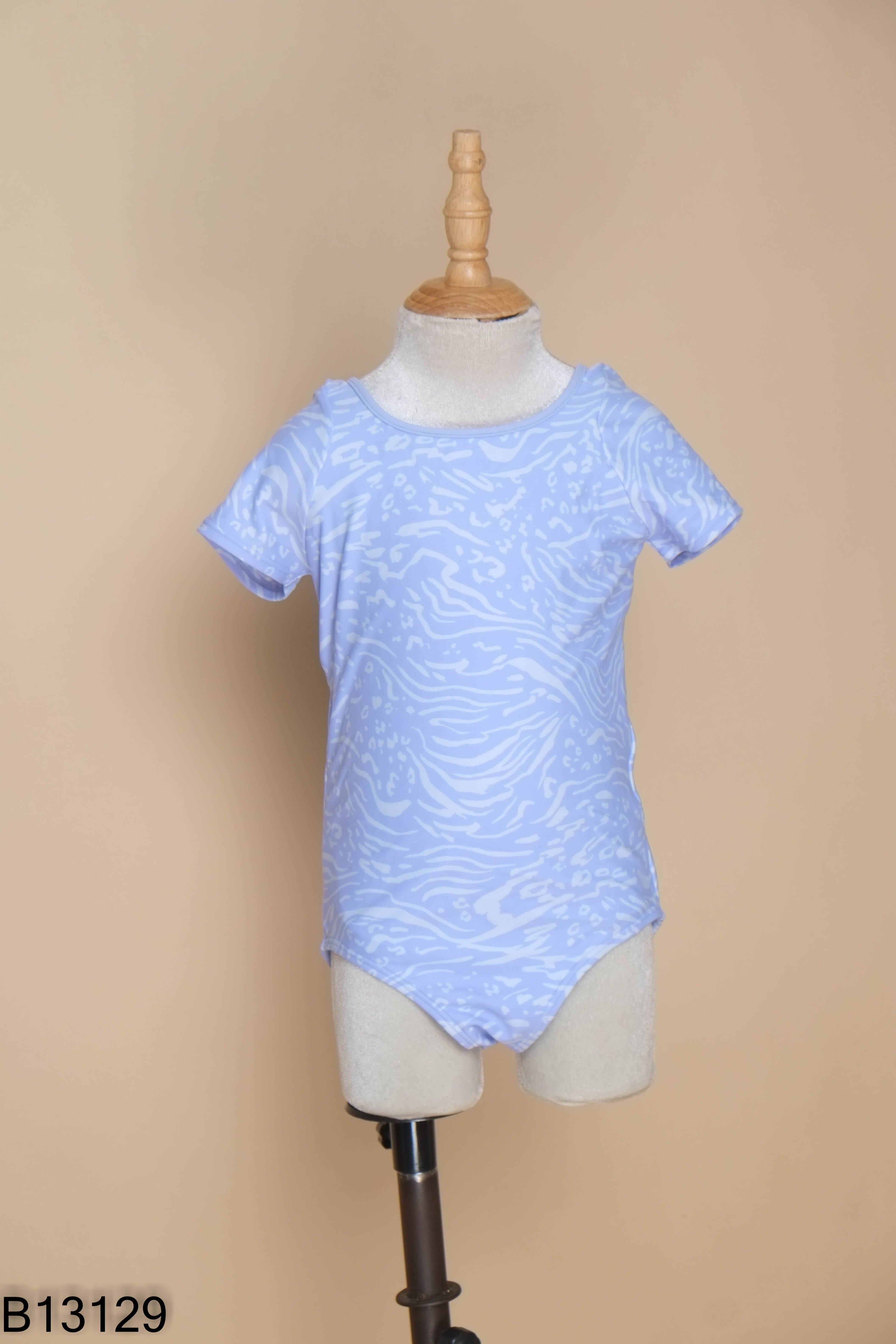 Jumpsuit ATHLETA xanh họa tiết trắng KIDS