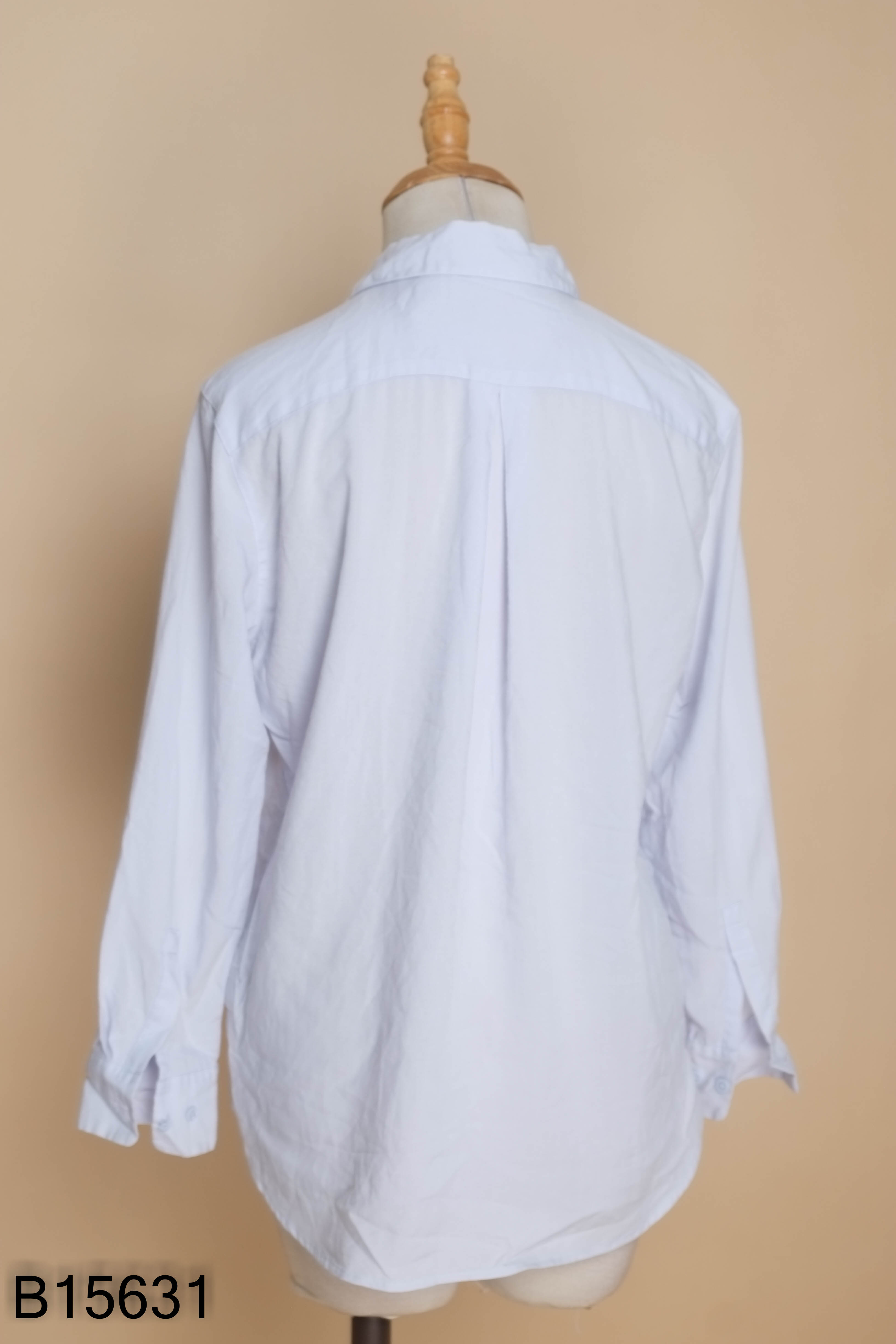 Áo sơ mi UNIQLO xanh trơn